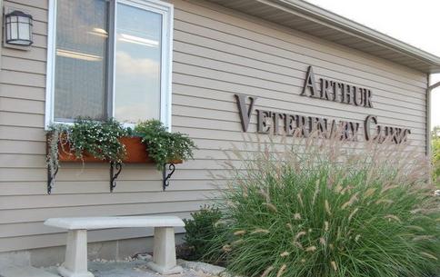 Arthur Veterinary Clinic — the metal-sided clinic building with its routed sign in Arthur, Illinois